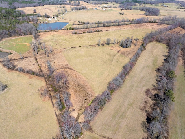 aerial view featuring a rural view and a water view