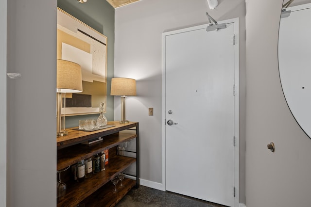 foyer entrance with baseboards