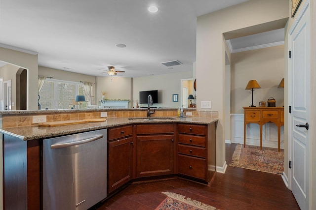 kitchen featuring a sink, visible vents, light stone counters, and stainless steel dishwasher