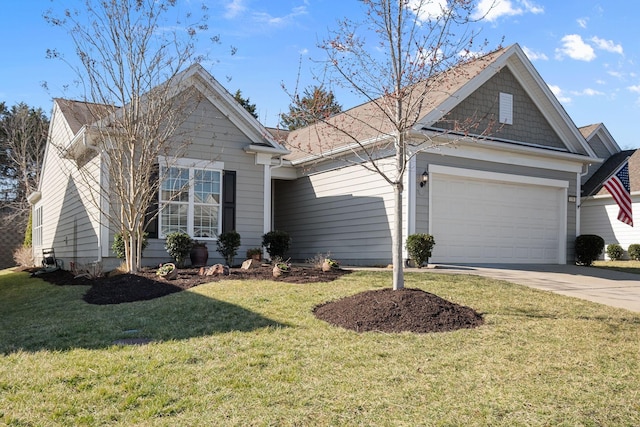 single story home with driveway, a front yard, and an attached garage