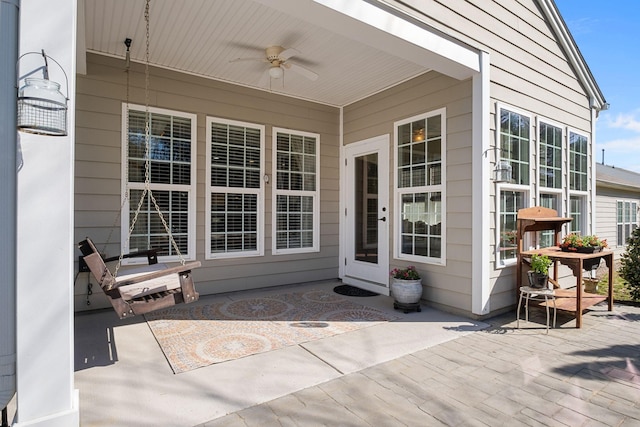 exterior space featuring a patio and ceiling fan