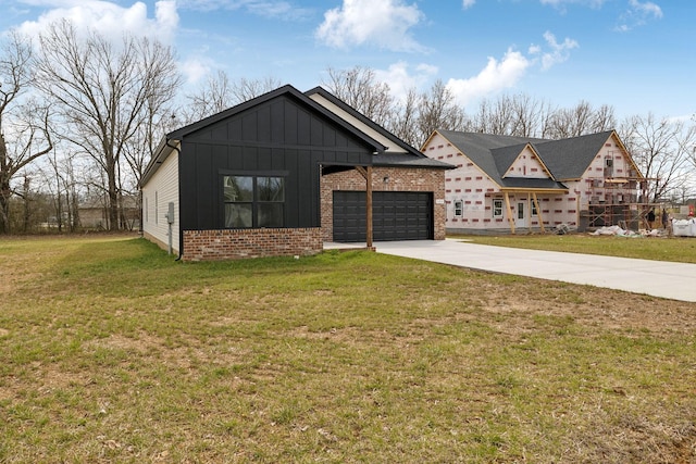 view of front of property featuring brick siding, board and batten siding, a front lawn, concrete driveway, and a garage