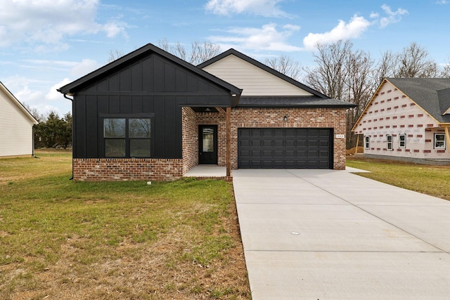 view of front of home featuring a front lawn, an attached garage, brick siding, and board and batten siding