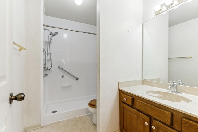 full bath with toilet, wallpapered walls, tile patterned flooring, a shower, and vanity