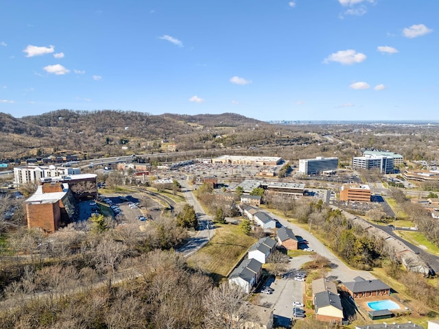 drone / aerial view featuring a mountain view