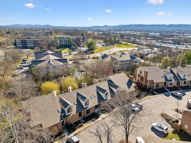 drone / aerial view featuring a mountain view