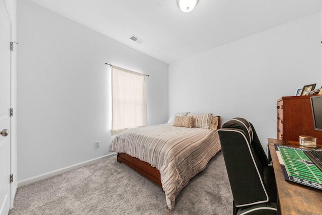 bedroom with visible vents, baseboards, and carpet floors