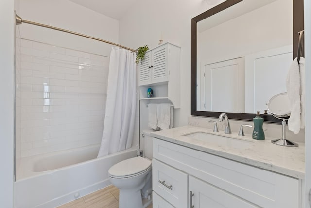 bathroom featuring vanity, shower / tub combo, toilet, and wood finished floors