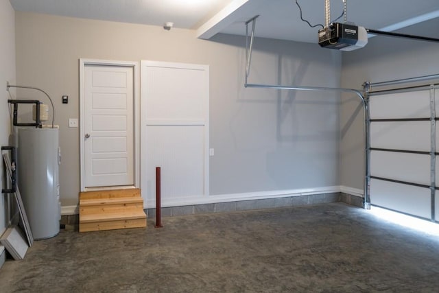 garage with a garage door opener and water heater