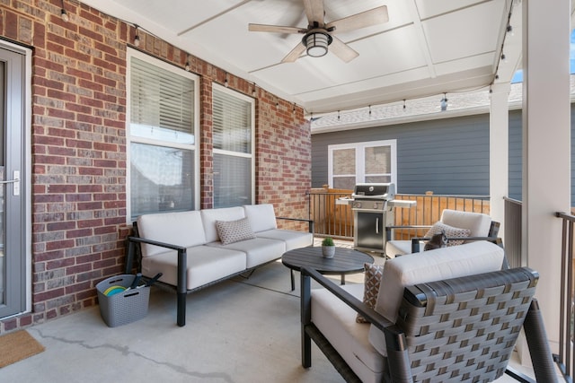 view of patio with a grill, outdoor lounge area, and ceiling fan