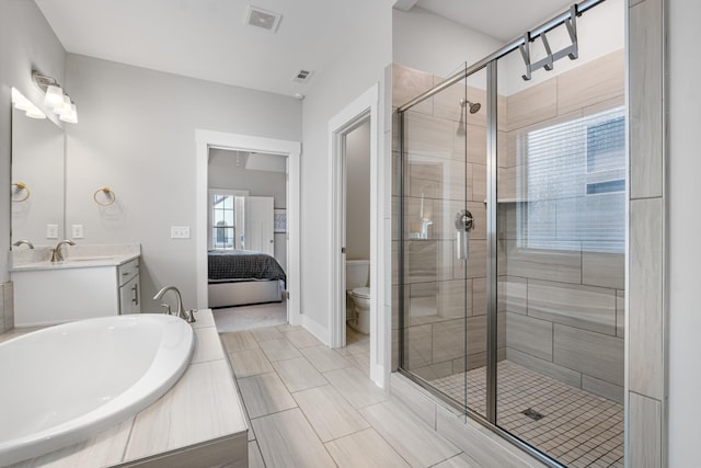 full bath with vanity, toilet, visible vents, and a stall shower