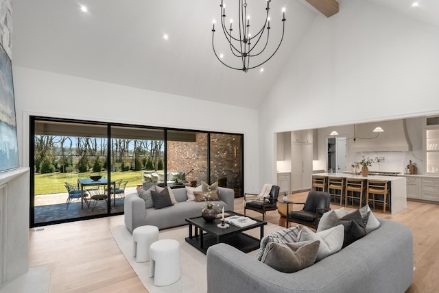 living room featuring light wood finished floors, beamed ceiling, recessed lighting, and high vaulted ceiling