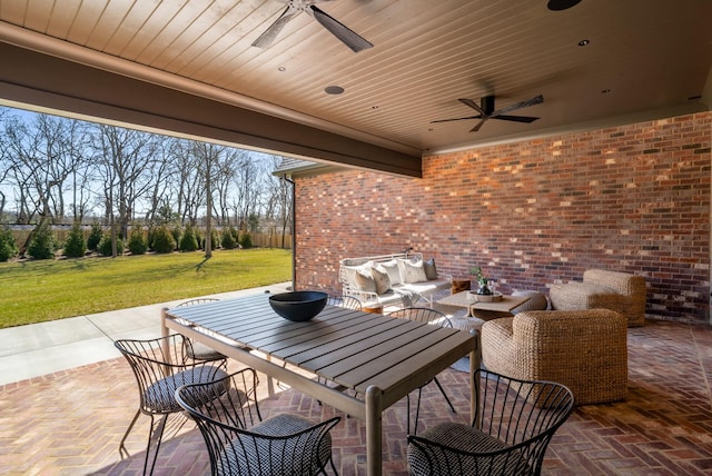 view of patio featuring an outdoor living space and a ceiling fan