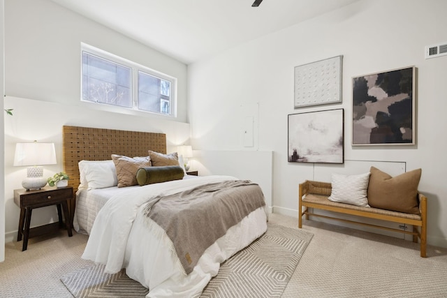 bedroom featuring visible vents, baseboards, and carpet floors