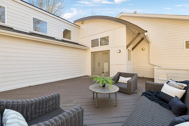 wooden deck featuring an outdoor living space