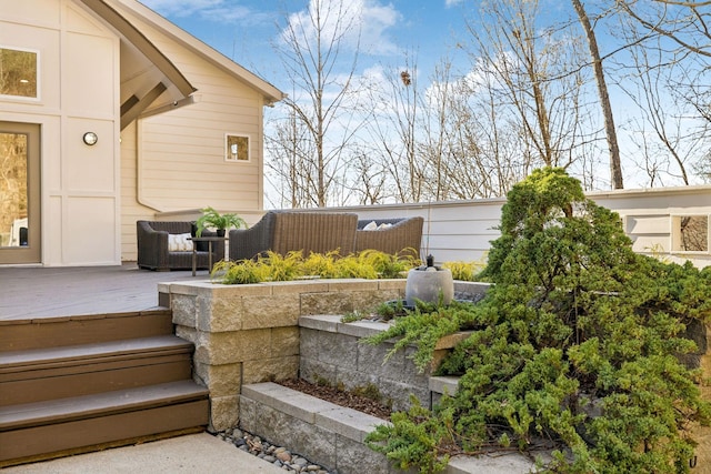 exterior space featuring an outdoor hangout area