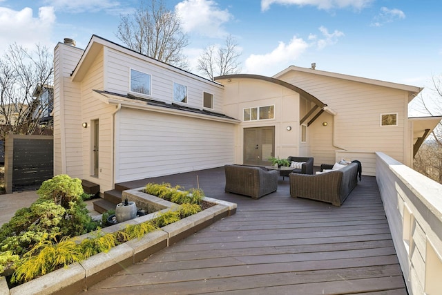 wooden deck with an outdoor hangout area