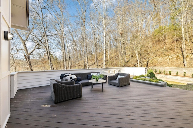 deck featuring outdoor lounge area