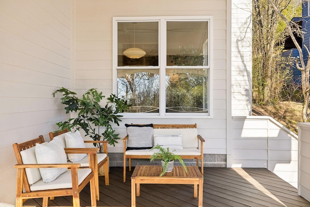 wooden deck with outdoor lounge area