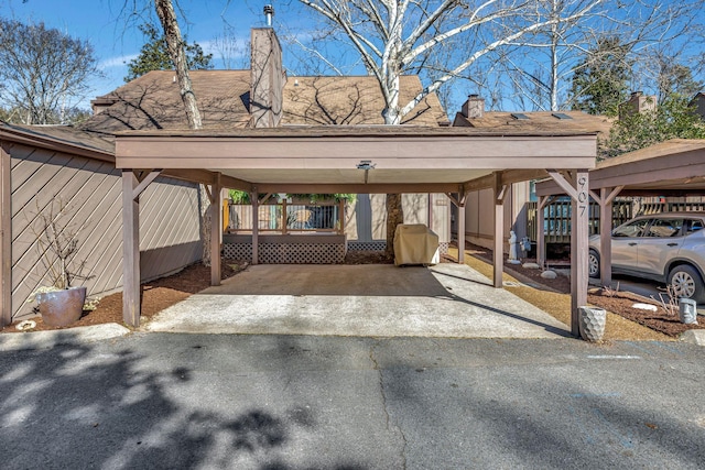 view of parking featuring a carport