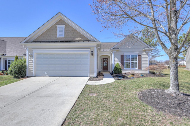 view of front of house with a standing seam roof, metal roof, concrete driveway, a front yard, and a garage