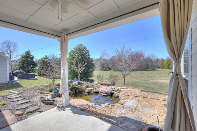 view of patio with a ceiling fan