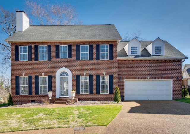 view of front facade featuring brick siding, a shingled roof, concrete driveway, a garage, and crawl space