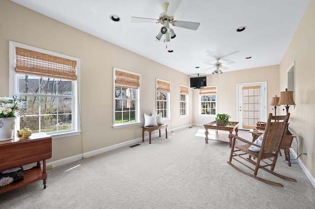 living area with baseboards, visible vents, carpet floors, recessed lighting, and ceiling fan