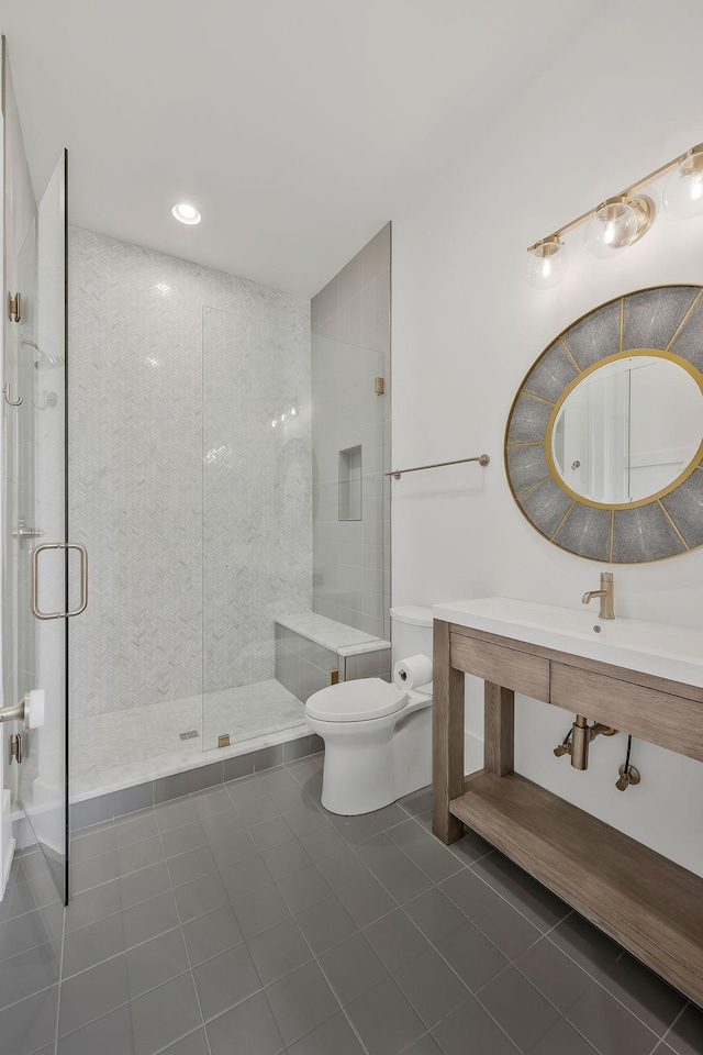 full bath with tile patterned flooring, a shower stall, and toilet