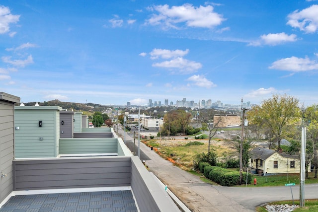 balcony featuring a city view