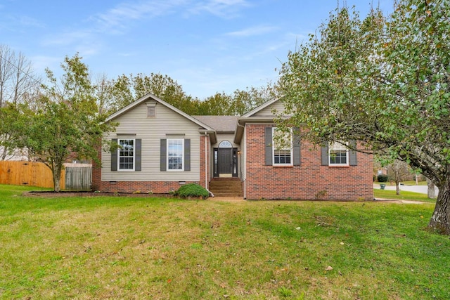 ranch-style home with crawl space, brick siding, a front yard, and fence