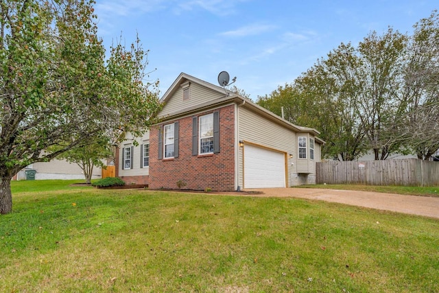 view of front of house with a front yard, fence, an attached garage, concrete driveway, and brick siding