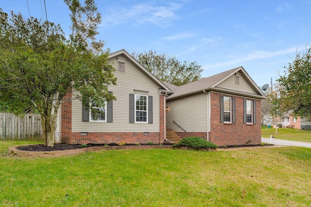 view of home's exterior featuring crawl space, a yard, and fence