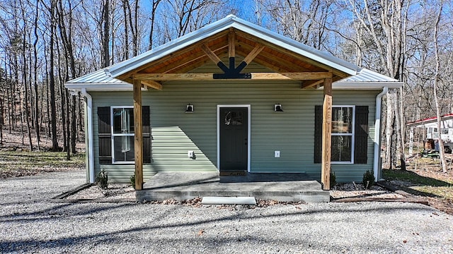 view of front of house with metal roof