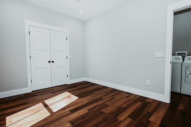 unfurnished bedroom featuring dark wood-type flooring and baseboards