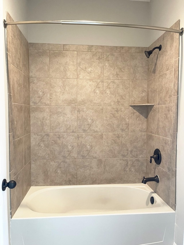 bathroom with shower / bath combination