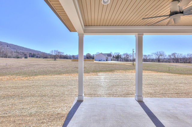 view of patio / terrace featuring a ceiling fan