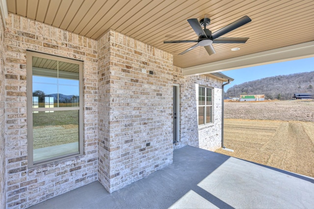 view of patio / terrace featuring ceiling fan