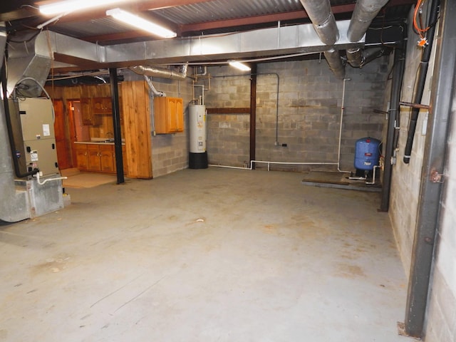 unfinished below grade area with heating unit and water heater