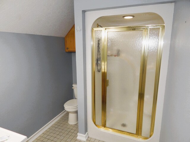 full bath with tile patterned flooring, a shower stall, a textured ceiling, and toilet