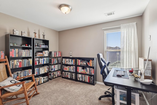 office space featuring visible vents and carpet