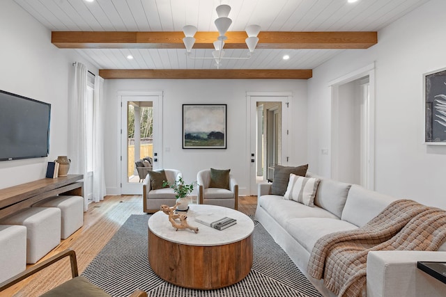 living room featuring beam ceiling, wood ceiling, recessed lighting, and light wood finished floors