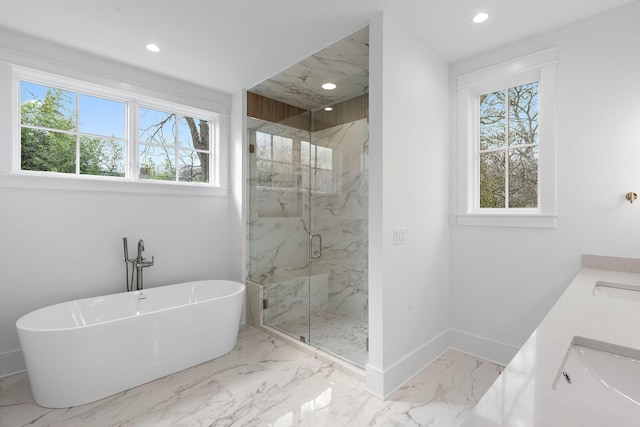 full bath featuring baseboards, a marble finish shower, recessed lighting, a sink, and marble finish floor