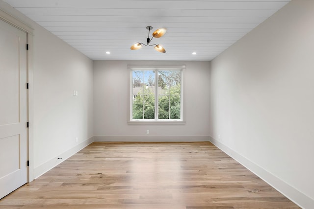 interior space with light wood finished floors, recessed lighting, and baseboards