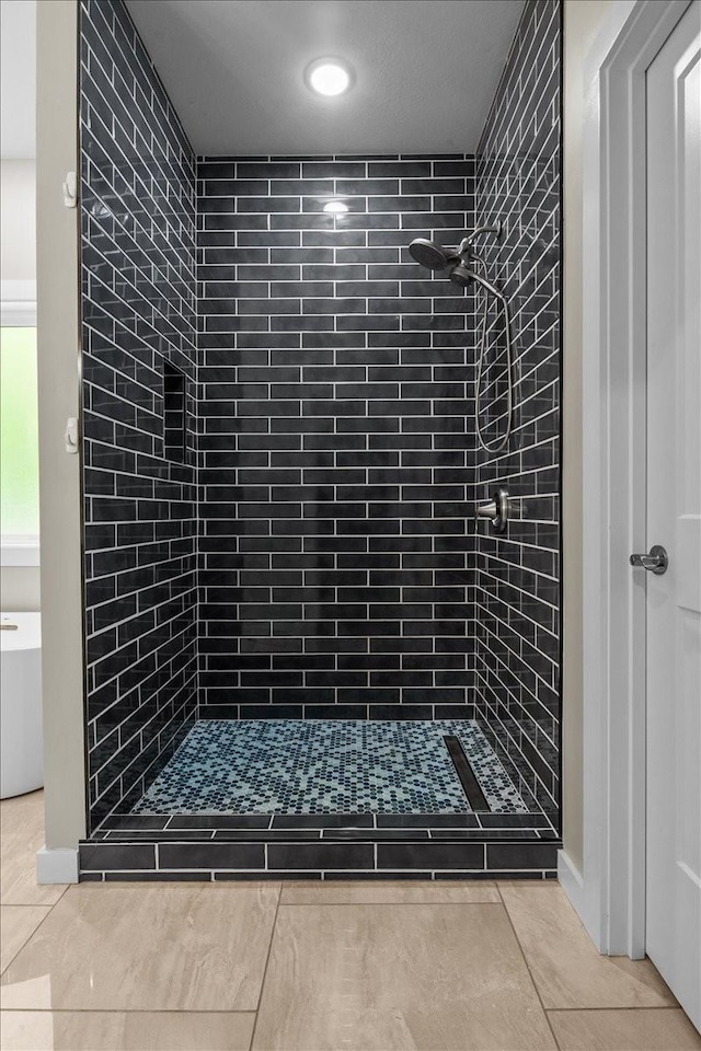 full bathroom featuring a shower stall, recessed lighting, and tile patterned floors