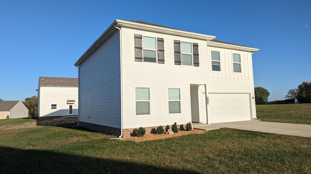 view of front of home with board and batten siding, a front yard, a garage, and driveway