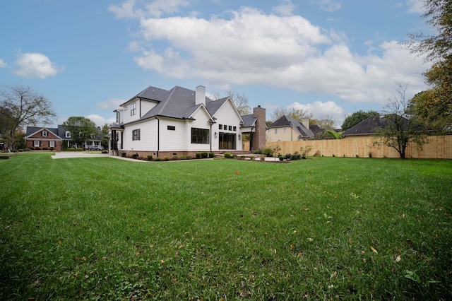 view of yard with fence