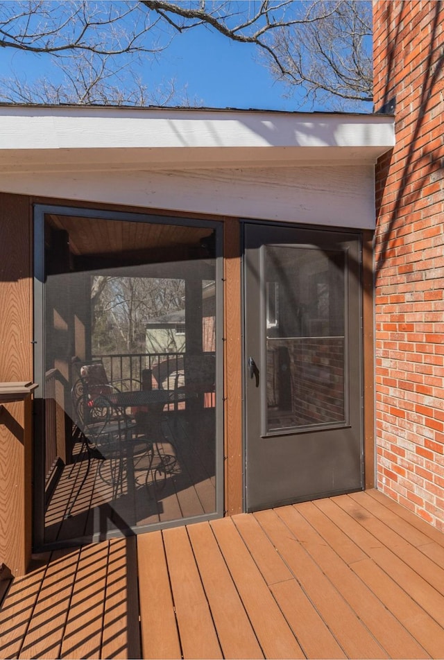 wooden terrace with a sunroom