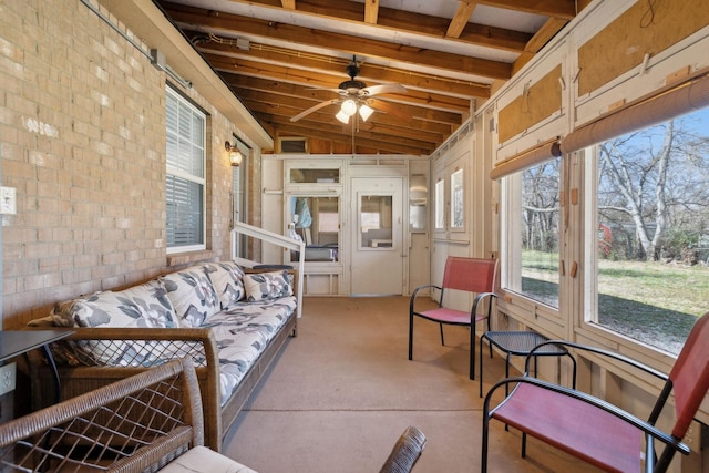 sunroom with ceiling fan