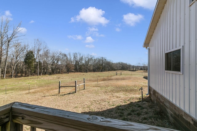 view of yard with a rural view